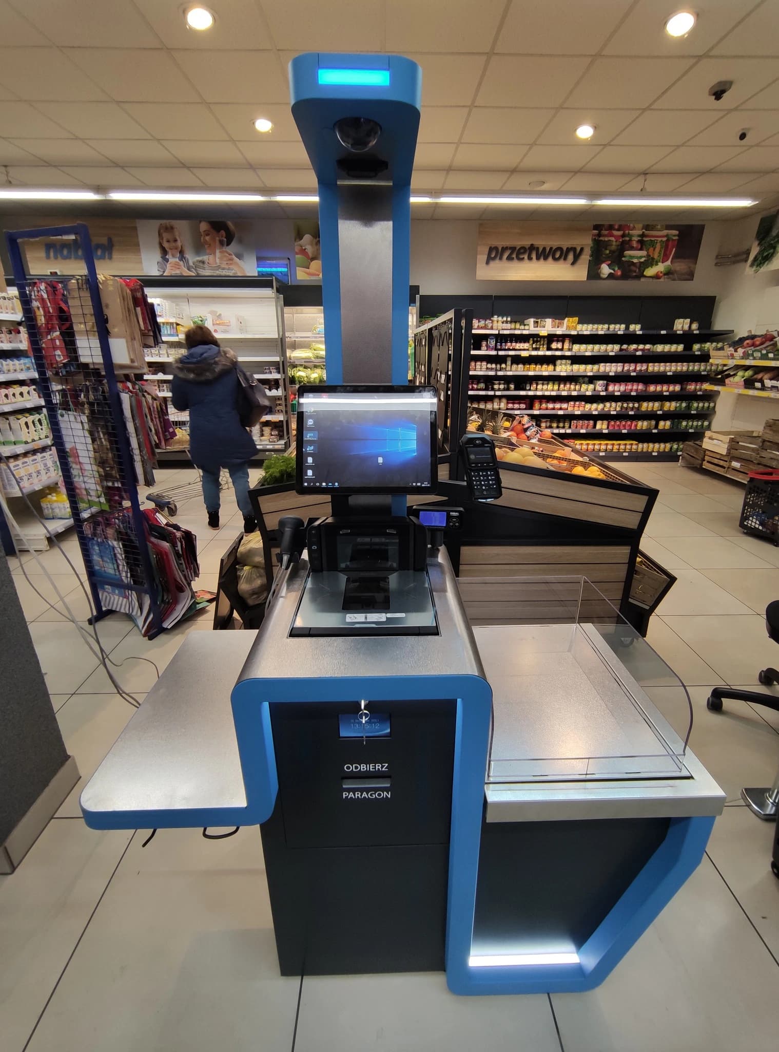 Modern retail store with POS systems and payment terminals